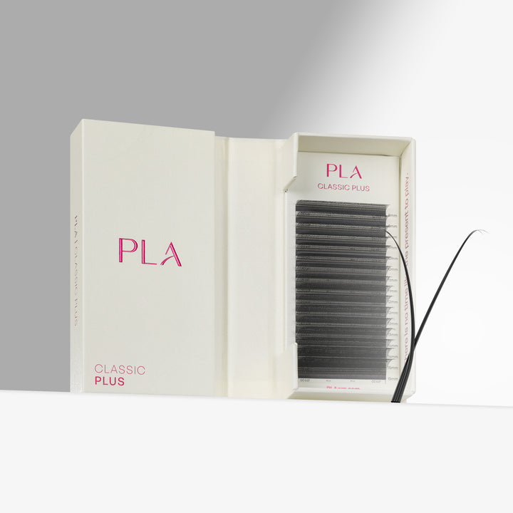 PLA Classic Plus false eyelash extension pack shown in its cream-colored packaging, with one single lash fan displayed outside the box against a clean white and gray background.