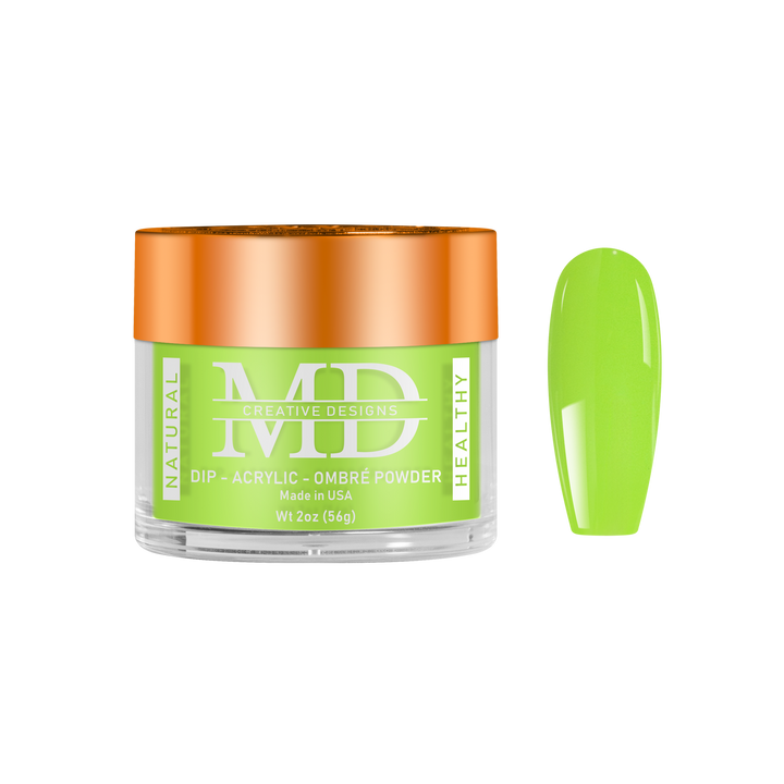 Green powder in a clear container with an orange lid on a white background