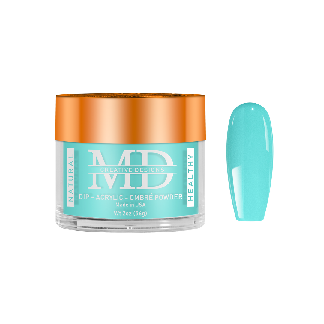 Turquoise nail powder in a clear container with orange lid on a white background
