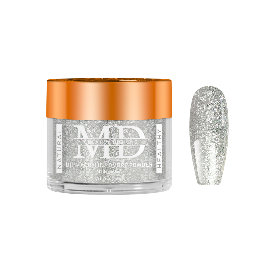 Jar of MD acrylic powder with a glittery silver nail tip swatch on a white background
