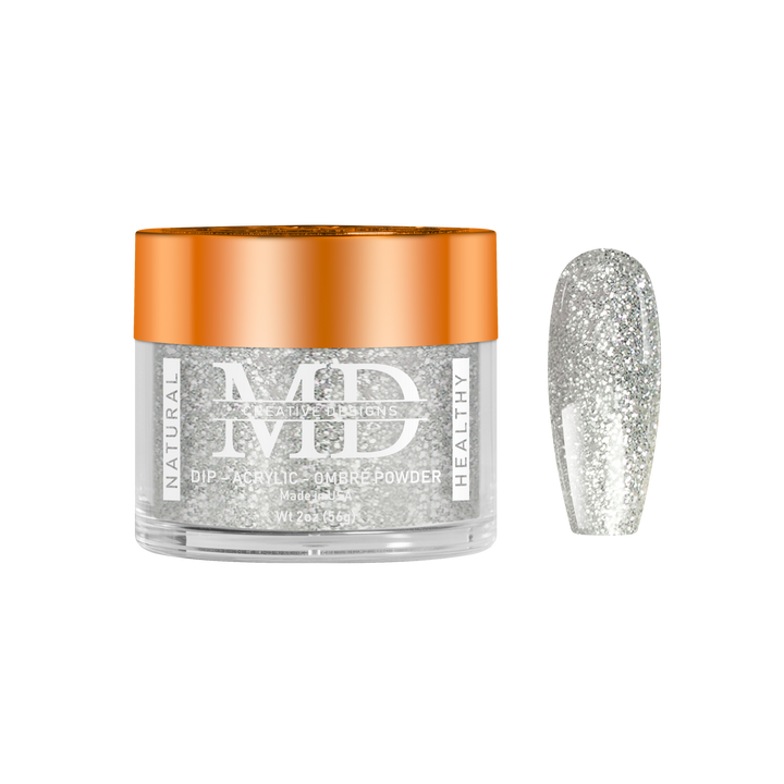 Jar of MD acrylic powder with a glittery silver nail tip swatch on a white background