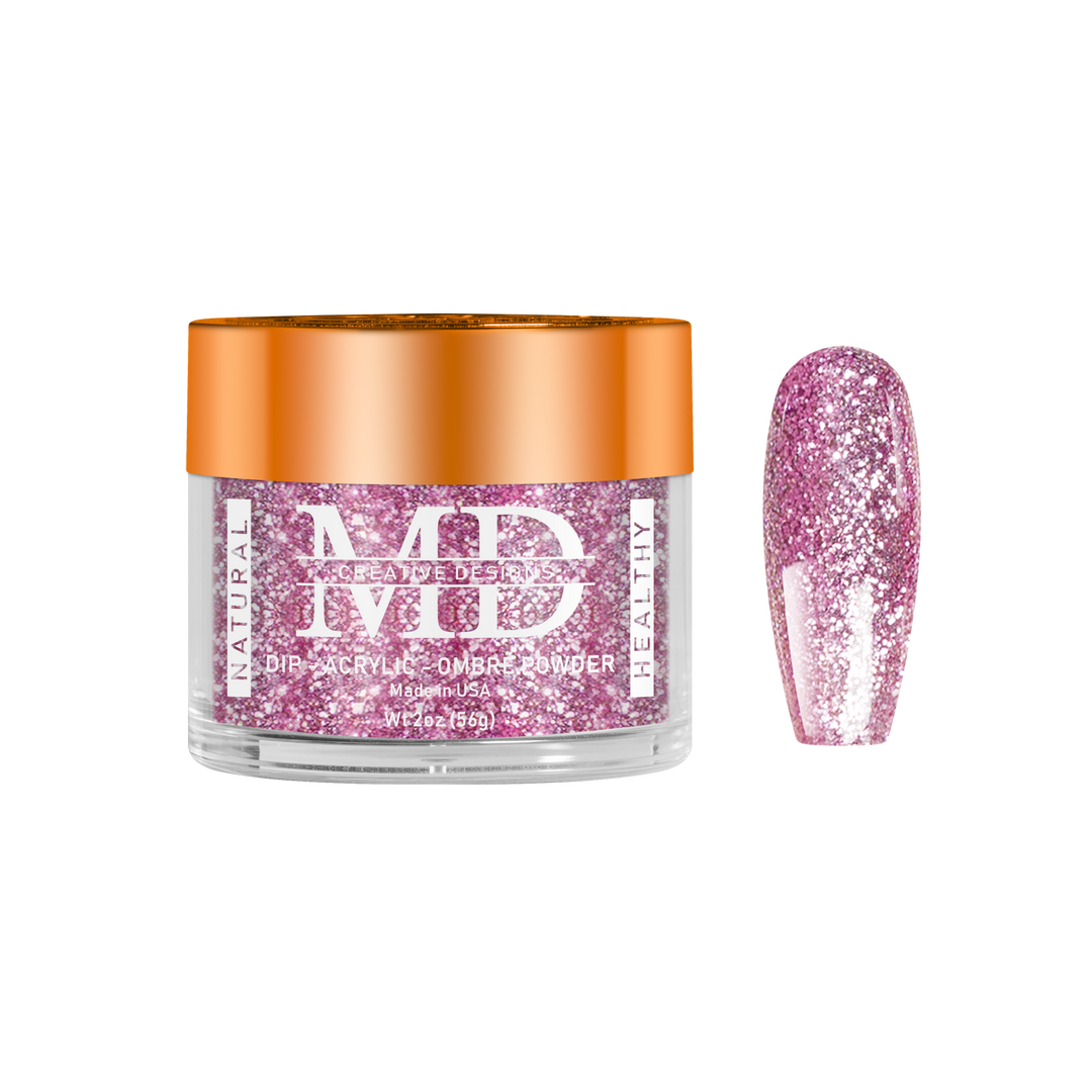 Jar of MD nail powder with a pink glittery nail tip swatch on a white background
