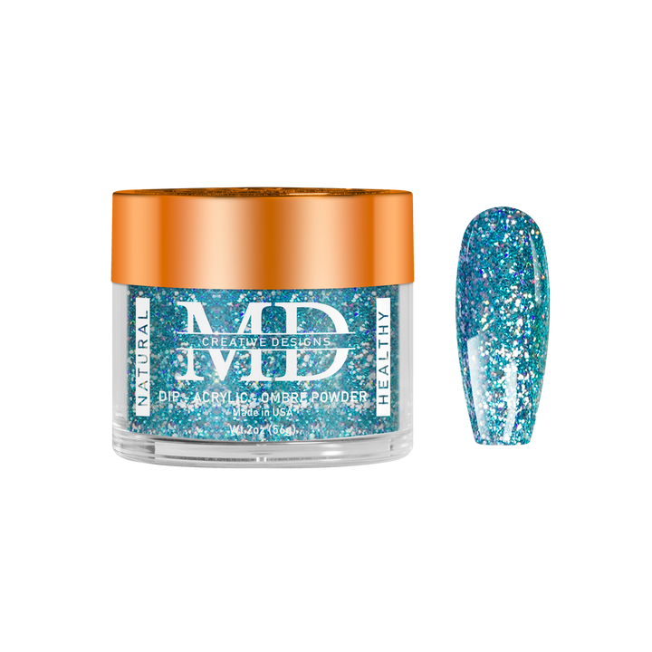Jar of blue glittery powder with a nail tip swatch on a white background