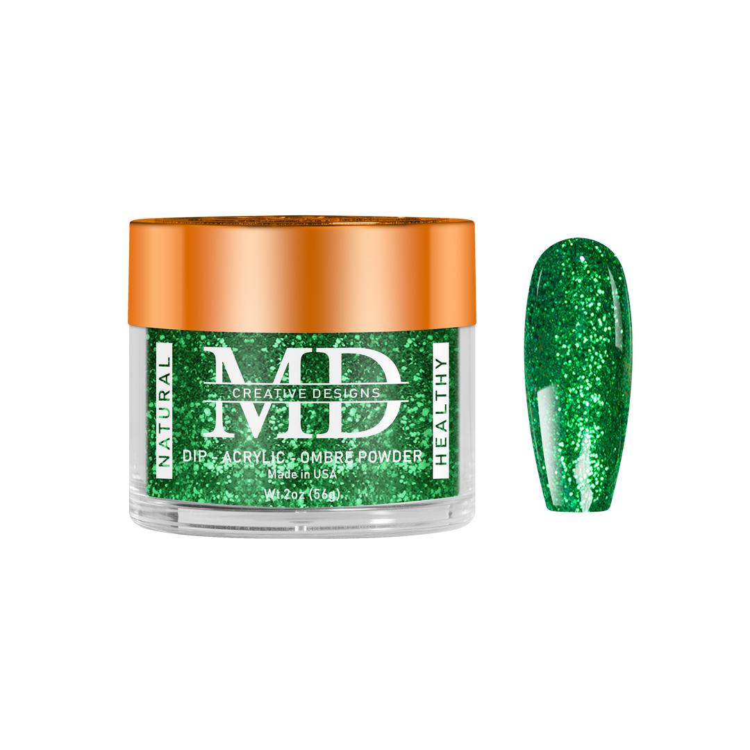 Green glittery powder in a jar with an orange lid on a white background