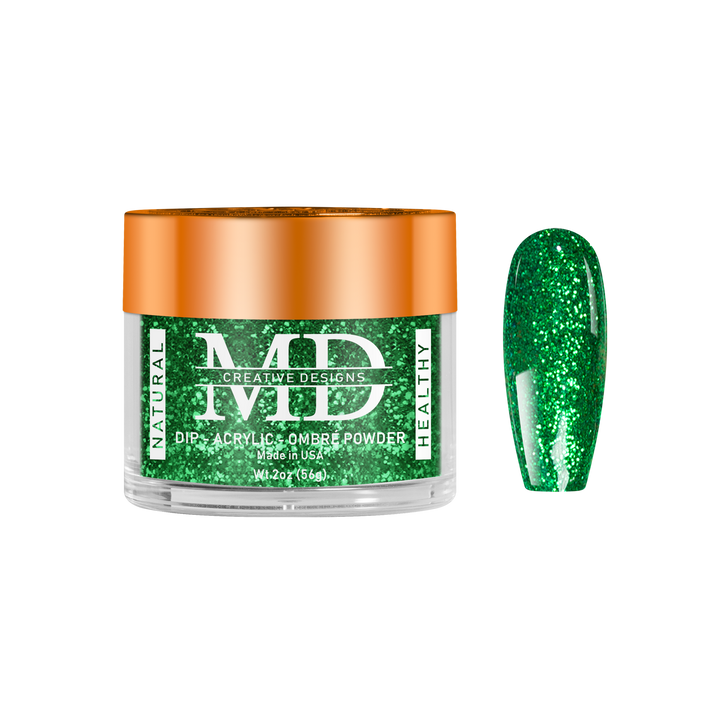 Green glittery powder in a jar with an orange lid on a white background
