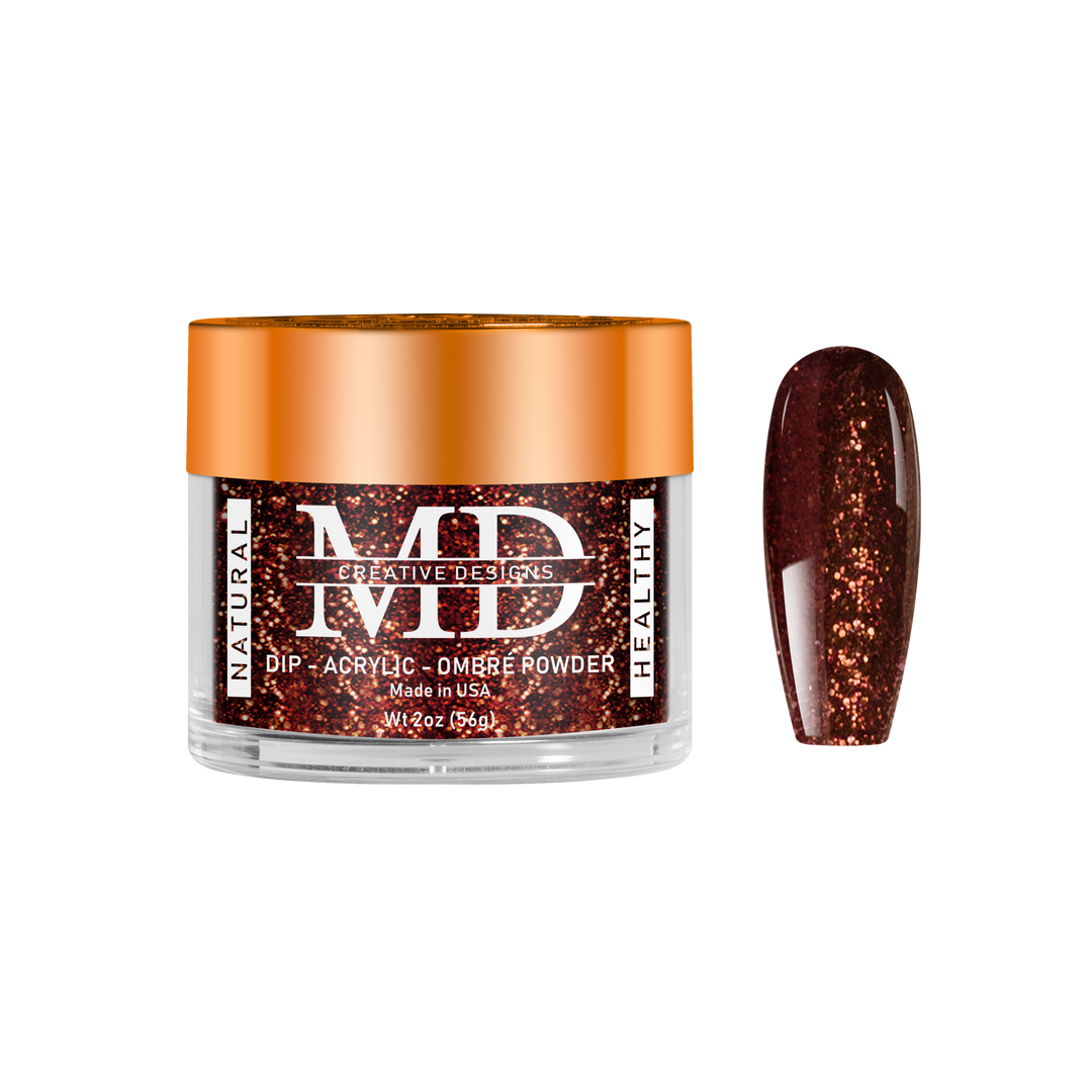 Jar of MD nail powder with a glittery brown nail tip swatch on a white background
