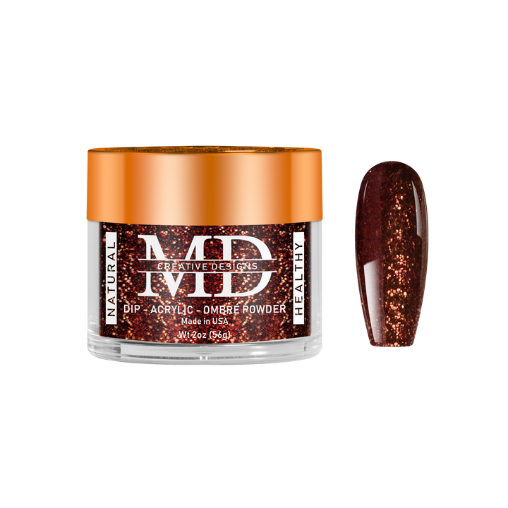 Jar of MD nail powder with a glittery brown nail tip swatch on a white background