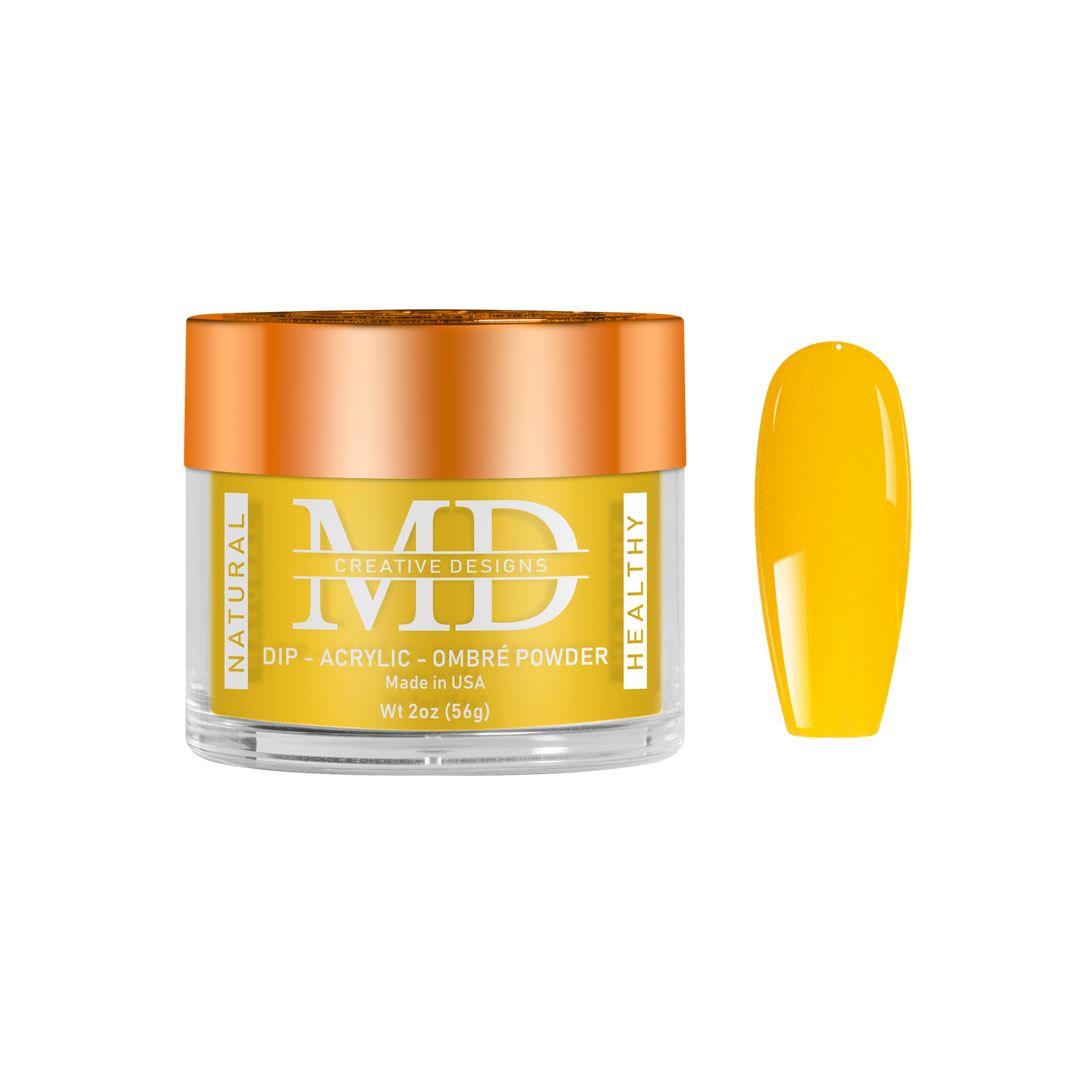 Yellow nail powder in a jar with an orange lid on a white background