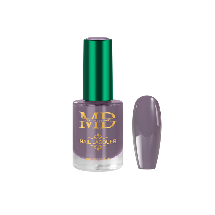 Nail polish bottle with a green cap and gold label on a white background