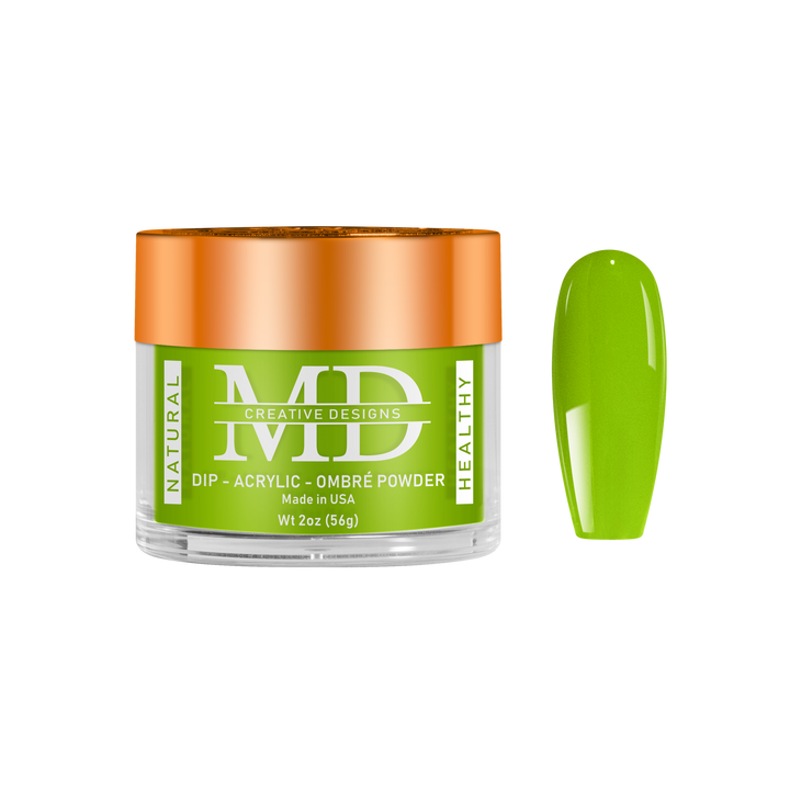 Green nail powder with orange lid on a white background