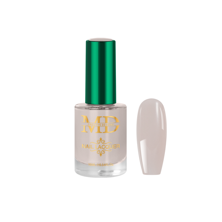 Nail polish bottle with green cap and gold text on a white background