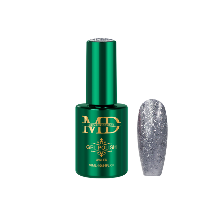 Green gel polish bottle with gold text and a glittery silver nail tip next to it on a white background