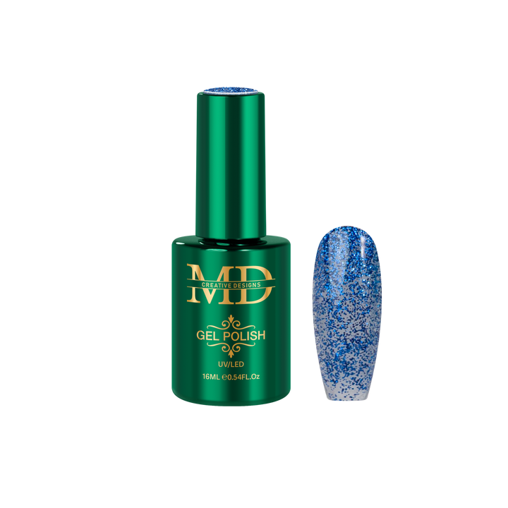 Green gel polish bottle with a blue glitter nail tip next to it on a white background