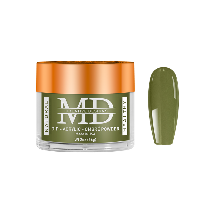 Green powder in a jar with an orange lid, labeled &