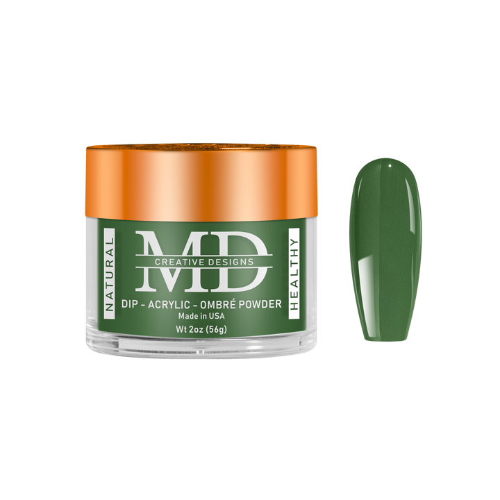 Green nail powder in a clear container with an orange lid on a white background