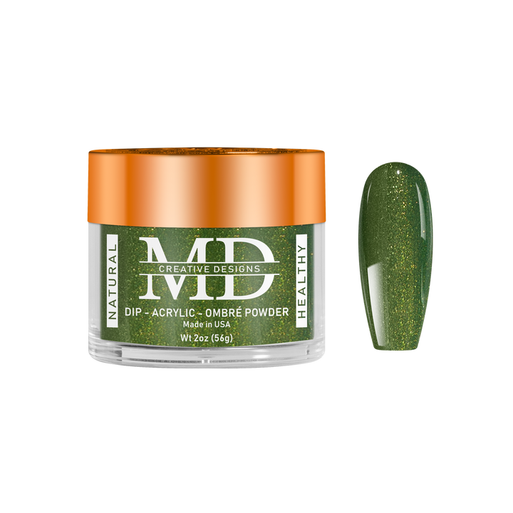 Green glittery nail powder in a clear container with orange lid on a white background