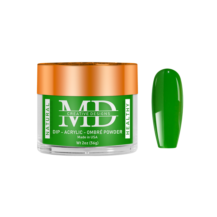 Green nail powder in a clear container with an orange lid on a white background