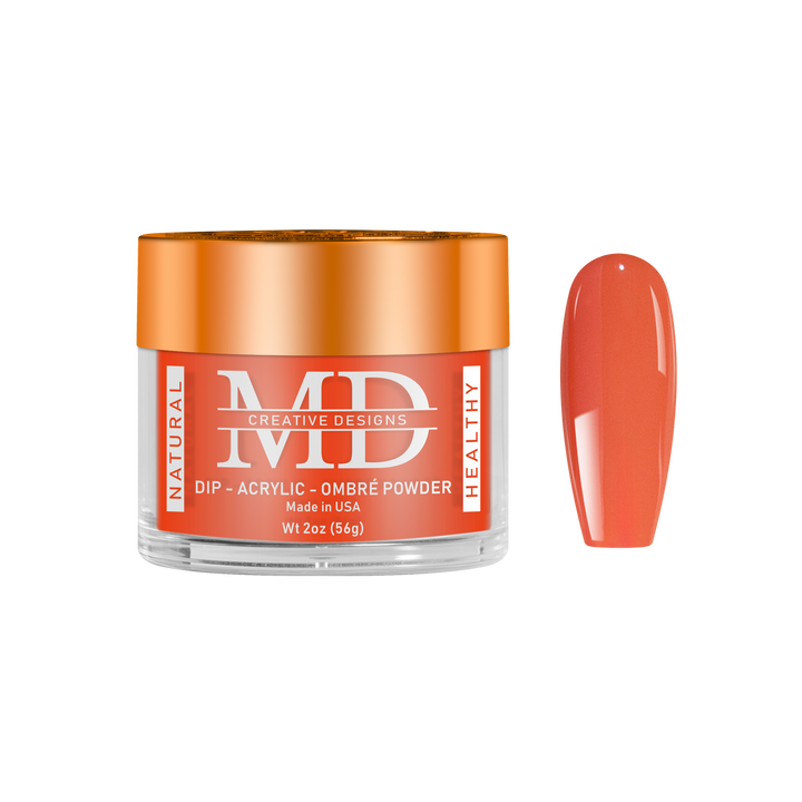Jar of MD nail powder with a swatch of orange nail color on a white background