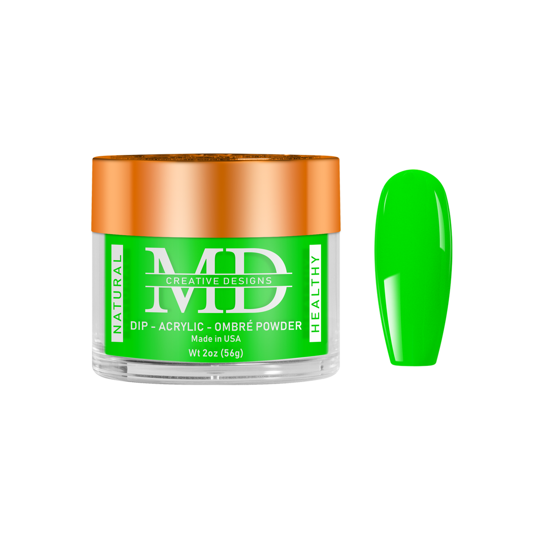 Green nail powder in a clear container with an orange lid on a white background