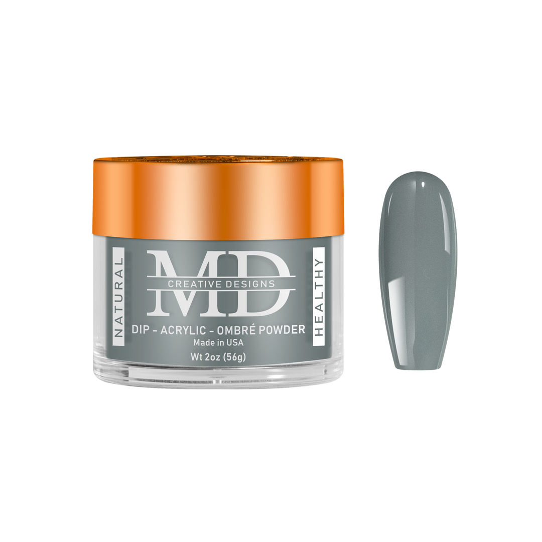 Jar of MD nail powder with a gray powder sample on a white background