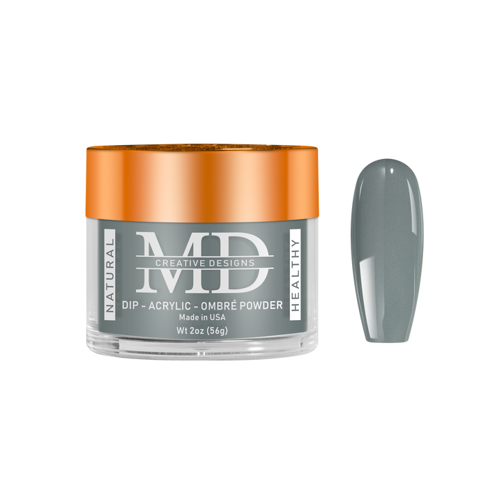 Jar of MD nail powder with a gray powder sample on a white background