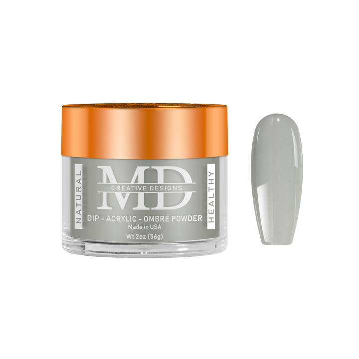 Jar of MD nail powder with a gray powder swatch on a white background