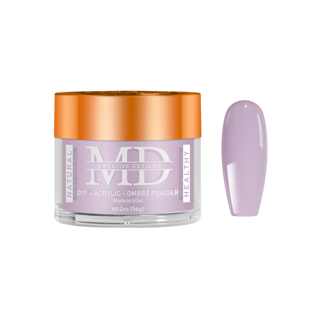 Jar of MD nail powder with a matching purple nail tip swatch on a white background