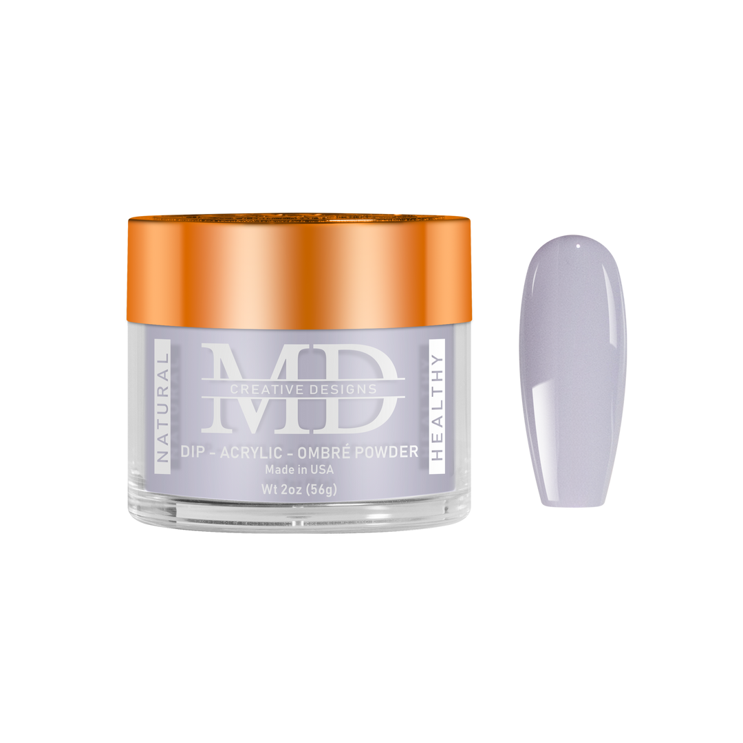 Jar of MD nail powder with a matching purple nail tip swatch on a white background