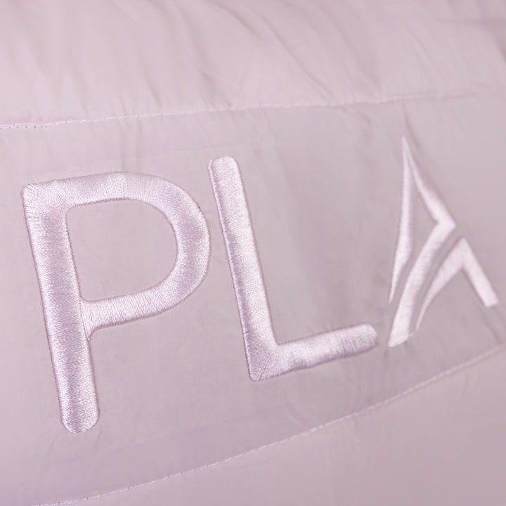 Close-up of a light pink tote bag with &