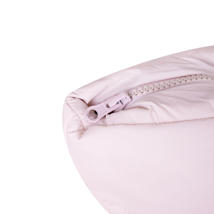 Close-up of a pink tote bag with zipper on a white background