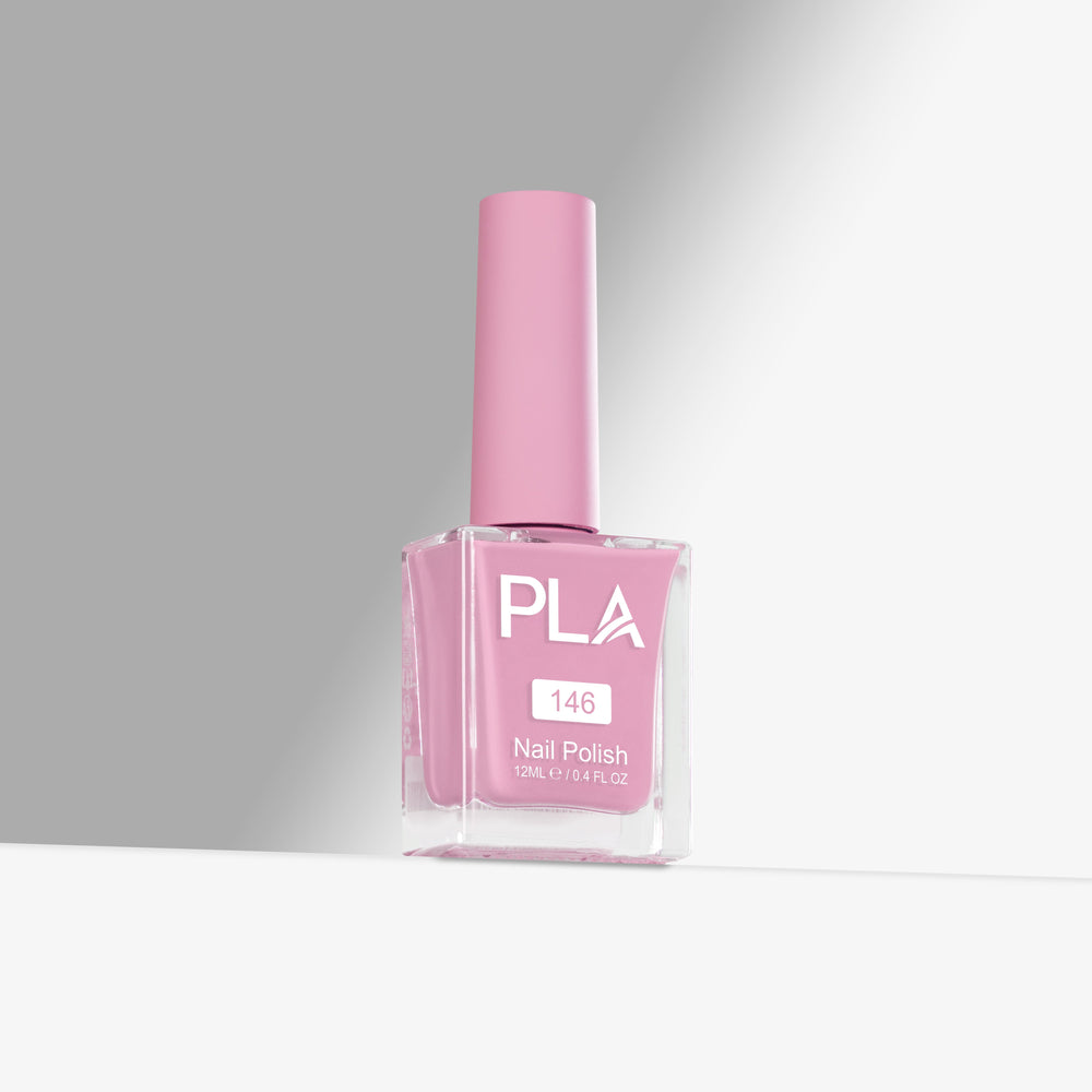 Pink nail polish bottle with 'PLA' branding on a gray background