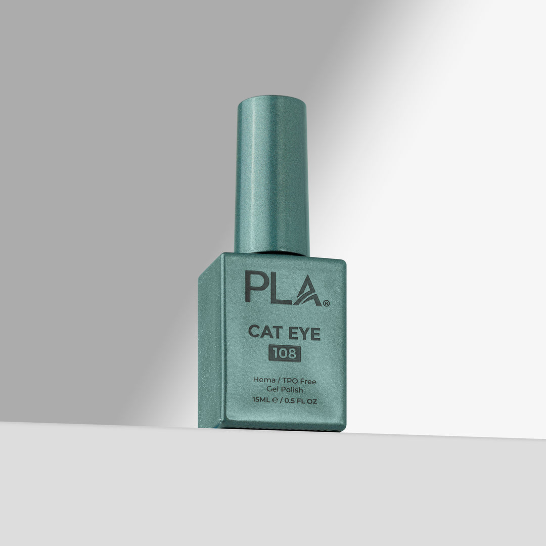 A bottle of PLA Cat Eye 108 nail polish in a green shade, standing upright on a light gray surface against a white background with a soft shadow.