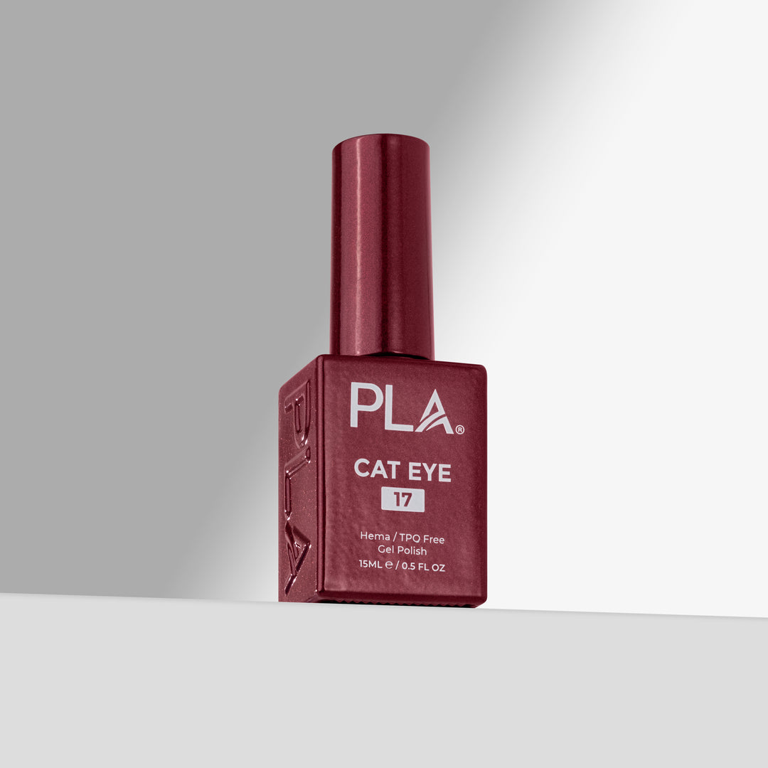 A bottle of PLA Cat Eye gel nail polish in shade 17, featuring a deep burgundy-red bottle and cap, set against a clean gray studio background.