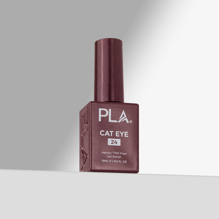 A bottle of PLA Cat Eye nail polish in shade 24, featuring a dark red cap and a matching dark red rectangular bottle with white lettering, set against a clean gray studio background.
