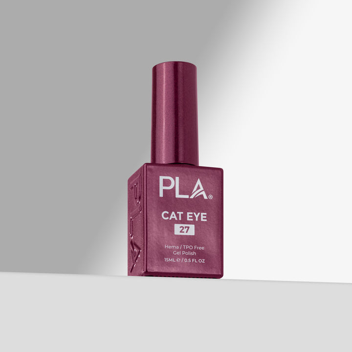 A bottle of PLA Cat Eye gel nail polish in shade 27, featuring a plum cap and a matching square bottle with white text, set against a clean gray gradient background.