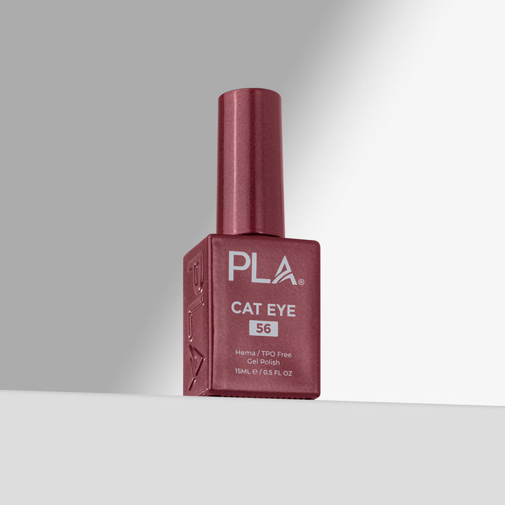 A bottle of PLA Cat Eye gel nail polish in shade 56, featuring a rose cap and a matching square bottle with white text, set against a clean gray studio background.