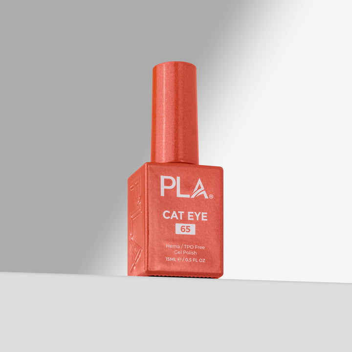 A bottle of PLA Cat Eye nail polish in shade 65, featuring a square orange-red bottle and a matching cylindrical cap, set against a clean gray studio background.