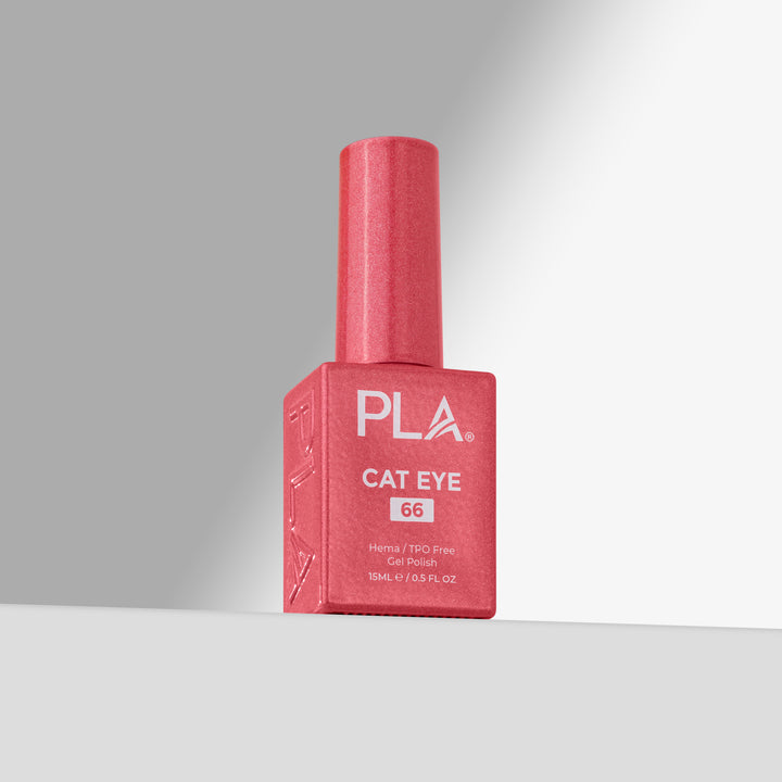 A bottle of PLA Cat Eye gel nail polish in shade 66, featuring a coral-pink finish and a matching cap, set against a clean gray studio background 
