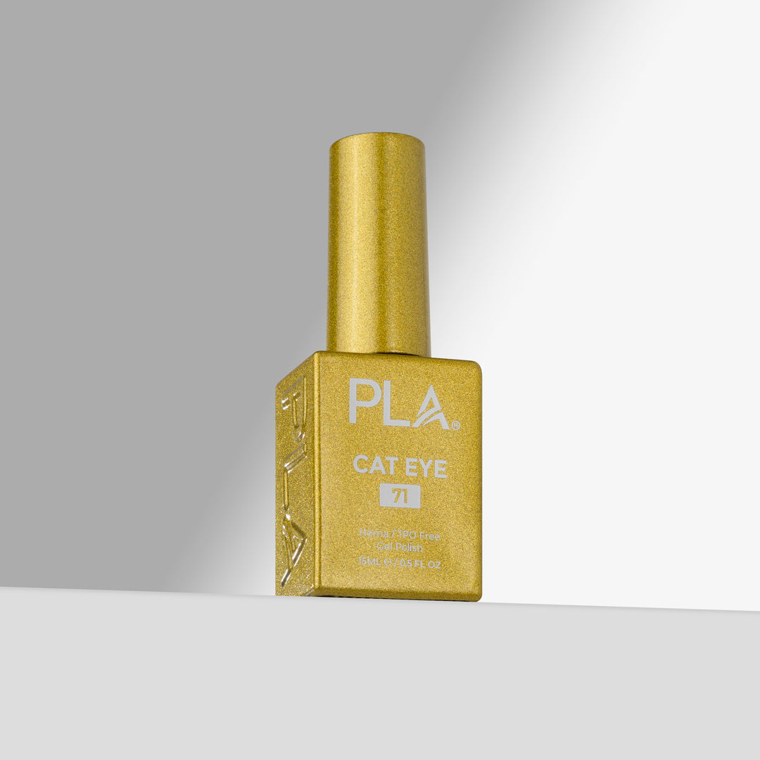 A bottle of PLA Cat Eye gel nail polish in shade 71, featuring a yellow cap and a square gold bottle with white lettering, set against a clean gray and white studio background.
