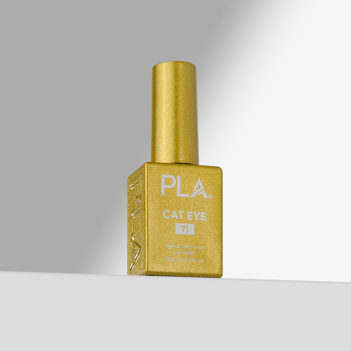 A bottle of PLA Cat Eye gel nail polish in shade 71, featuring a yellow cap and a square gold bottle with white lettering, set against a clean gray and white studio background.