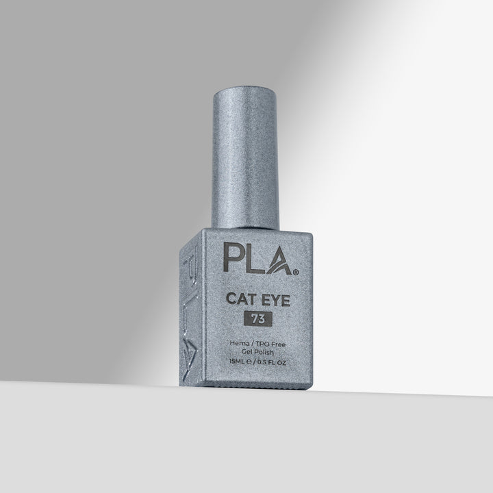 A bottle of PLA Cat Eye gel nail polish in shade 73, featuring a silver cap and a silver-gray square bottle on a light gray background.