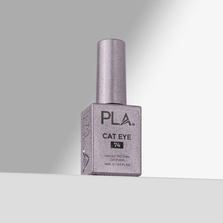 A bottle of PLA Cat Eye gel nail polish in shade 74, featuring a silver cap and a silver-gray bottle, set against a clean gray background 