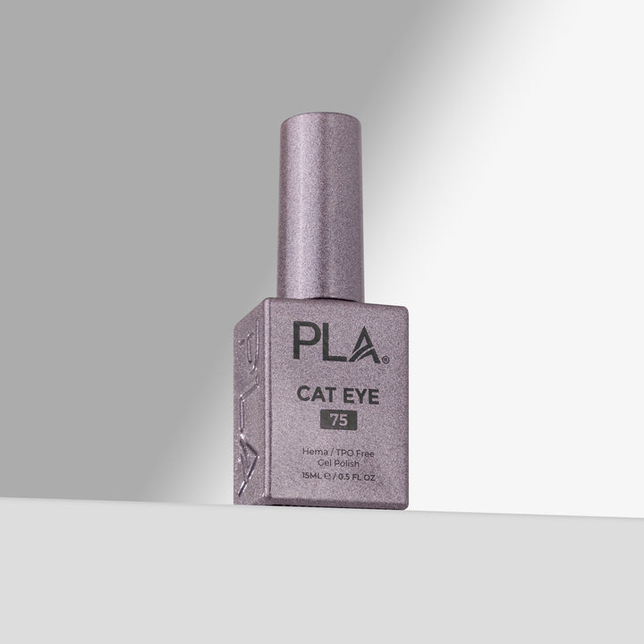 A bottle of PLA Cat Eye gel nail polish in shade 75, featuring a lavender-purple cap and a matching purple bottle with black lettering, set against a clean gray studio background.