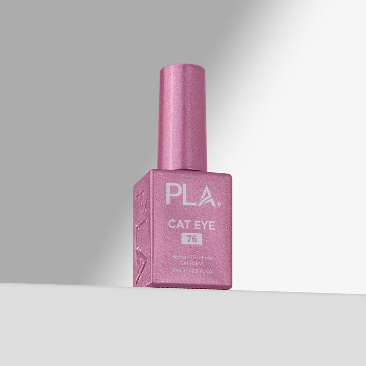 A bottle of PLA Cat Eye gel nail polish in shade 76, featuring a sparkling pink cap and a matching pink rectangular bottle with white lettering, set against a clean gray gradient background.