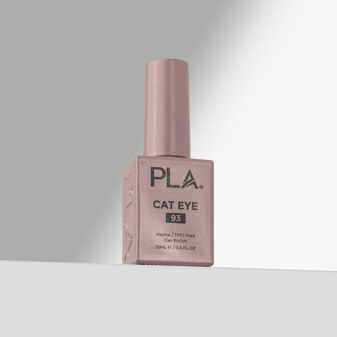 A bottle of PLA Cat Eye gel nail polish in shade 93, featuring a pink cap and a matching pink bottle with black text, set against a clean gray studio background.