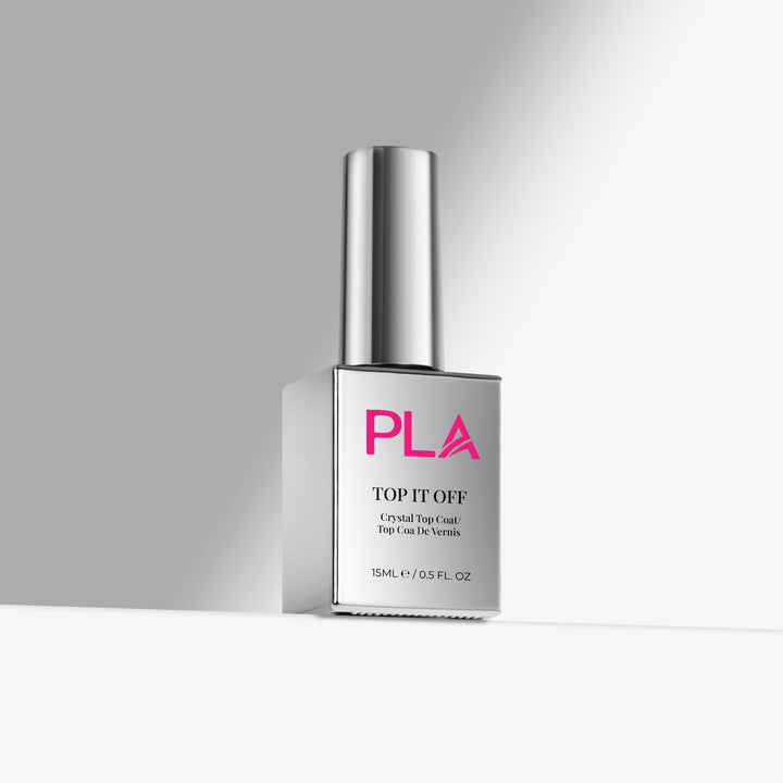 PLA Top It Off Top Coat for gel polish nail polish bottle on a gray background