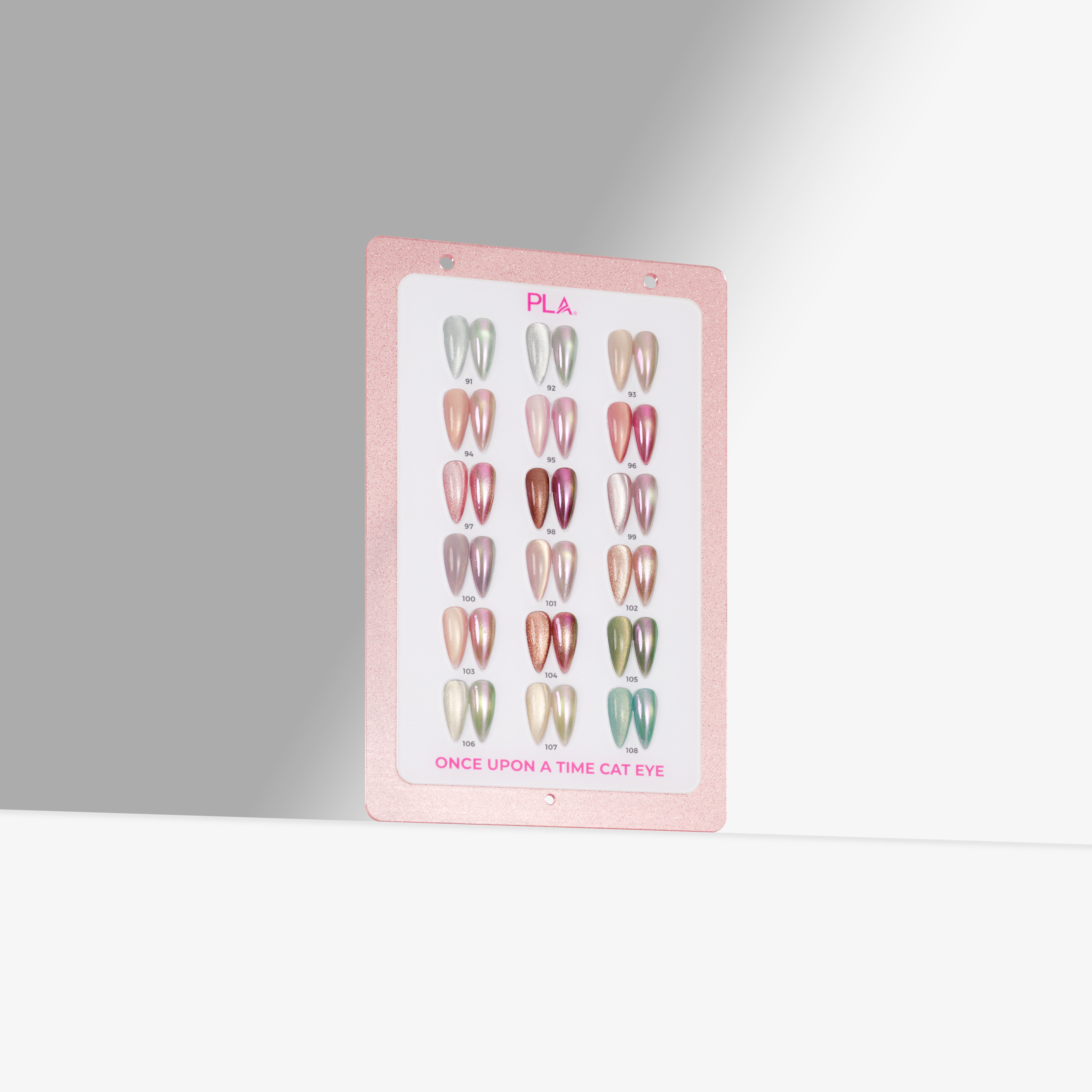 A pink swatch for 'PLA Once Upon A Time Cat Eye' nail polish, showing multiple rows of nail tips in various shimmering colors, set against a gray and white background.