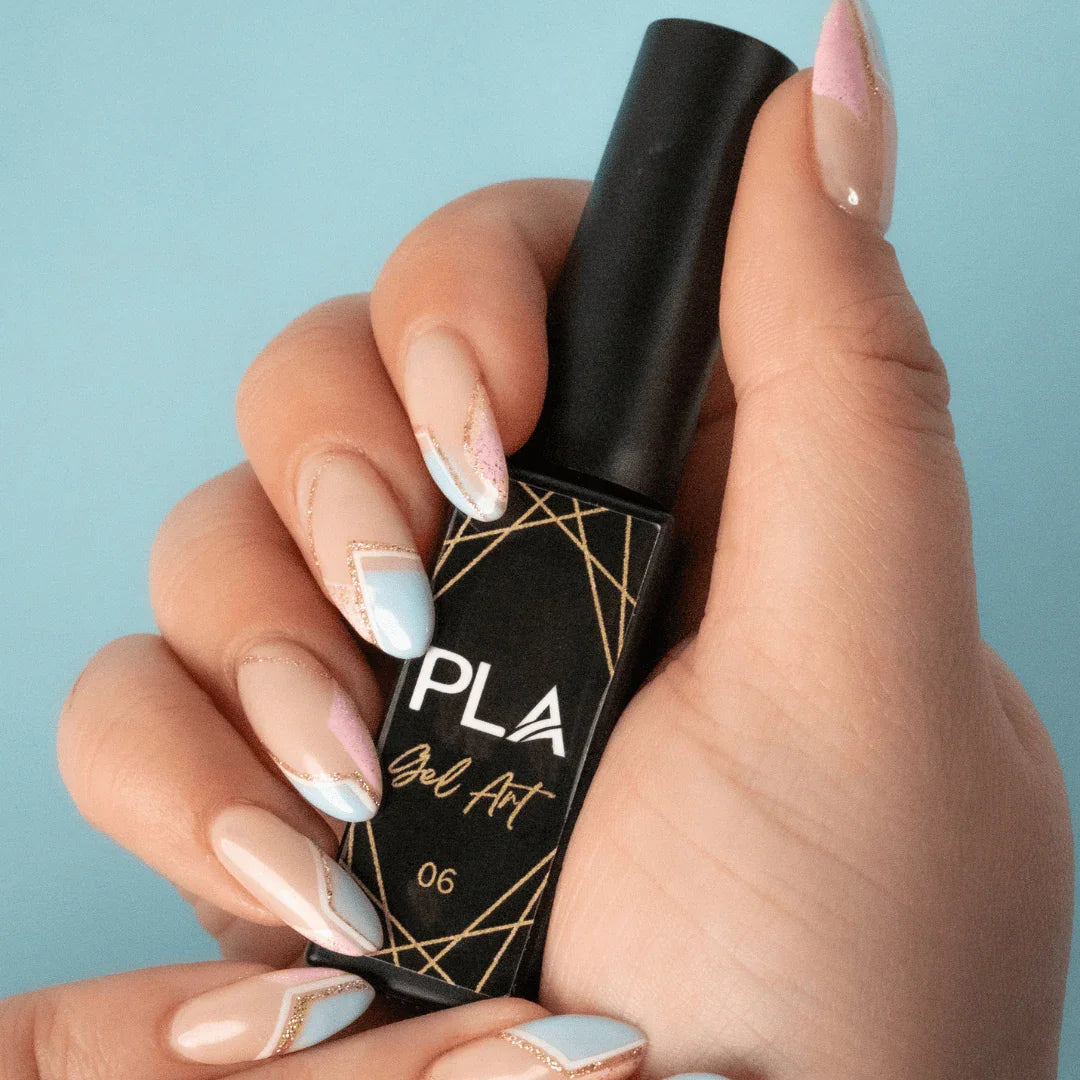 Nail set using PLA Gel Liners from Paris Lash Academy (pink, blue, gold line and shape nail set, front view holding bottle)