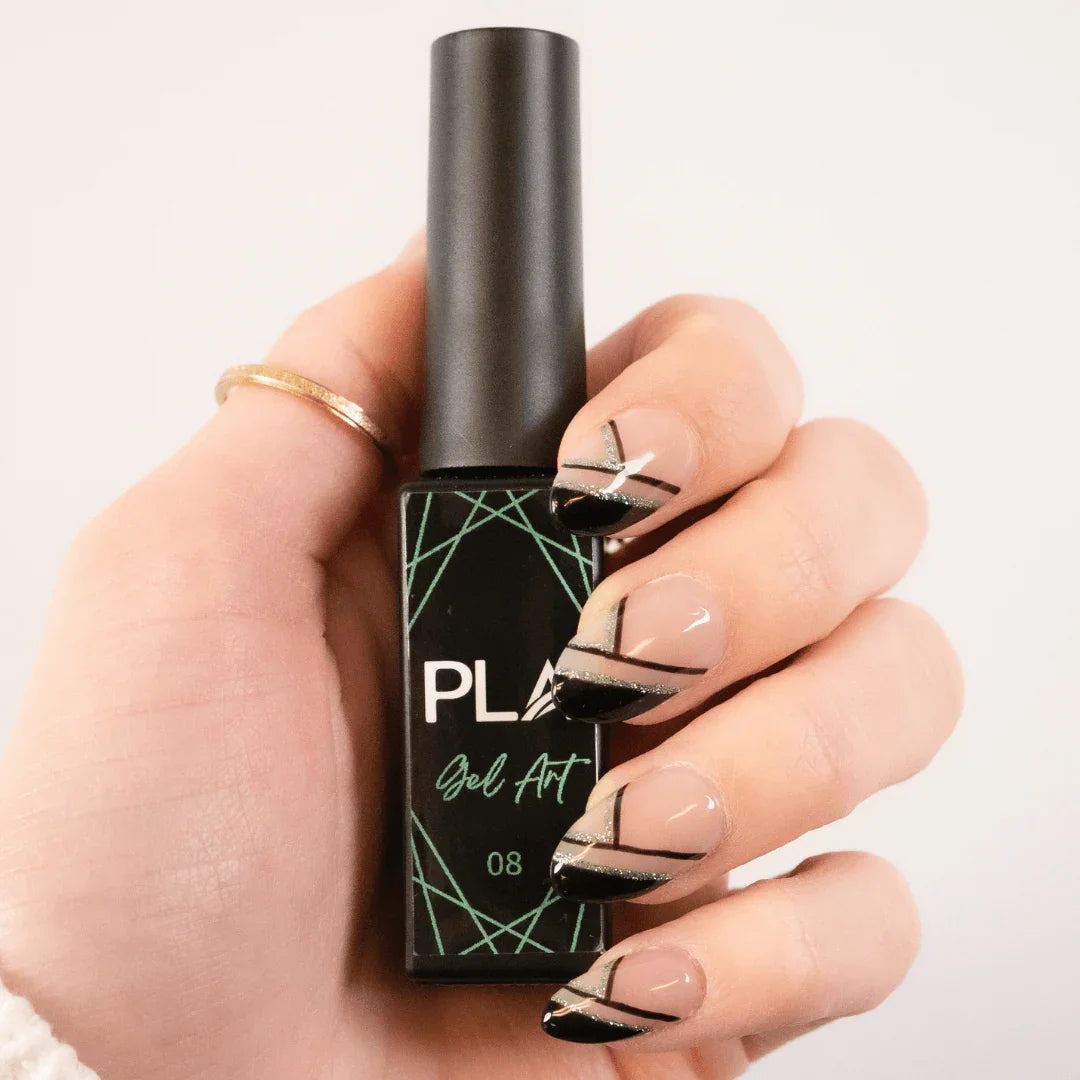 Nail set using PLA Gel Liners from Paris Lash Academy (green and black line nail set, front view holding bottle)