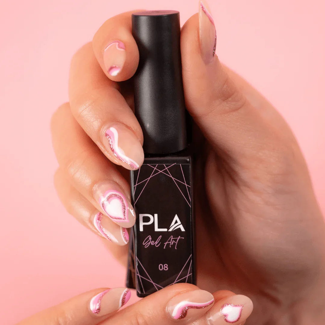 Nail set using PLA Gel Liners from Paris Lash Academy (pink and white heart and lines nail set, front view holding bottle)